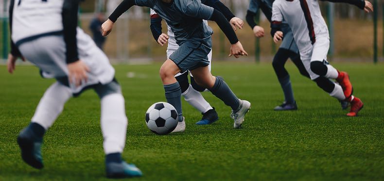 Boys playing football